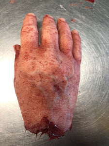 Severed male hand