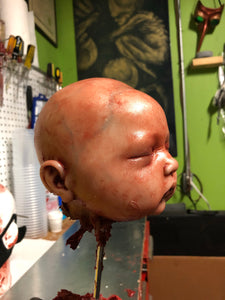 Severed baby head