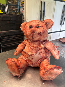 “Fleshy” stitched skin bear
