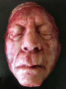 Skinned old man face